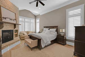 Master bedroom with light hardwood / wood-style floors, multiple windows, and ceiling fan