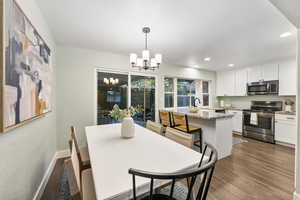 Open concept dining area adjacent to kitchen.