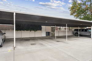 Two covered parking spots with access door to patio.