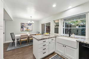 Kitchen window looks out to covered patio.