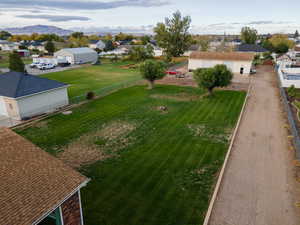 Aerial view from back of home to outbuilding