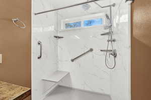 Bathroom with tiled shower