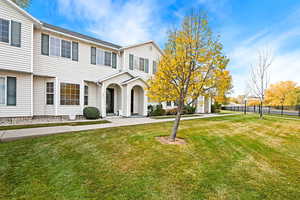 View of front of home with a front yard