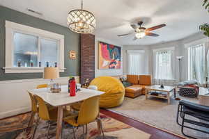 Stunning open dining area and living area on the second floor unit.