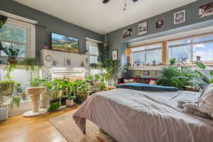 Rear unit bedroom with fireplace.