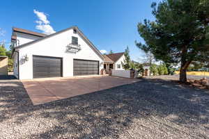 View of front of property featuring a garage