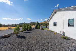 View of yard with a mountain view