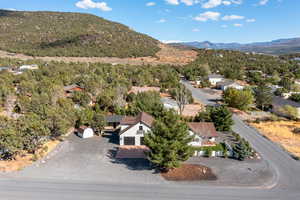 Birds eye view of property featuring a mountain view