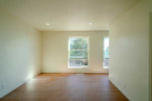 Spare room with light hardwood / wood-style floors