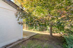 View of yard with a patio