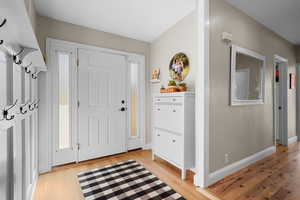 Foyer entrance featuring light wood-type flooring