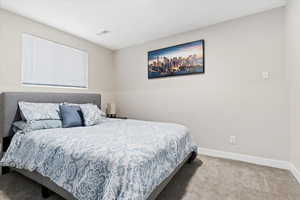 View of carpeted bedroom