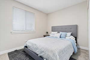 Bedroom with carpet flooring