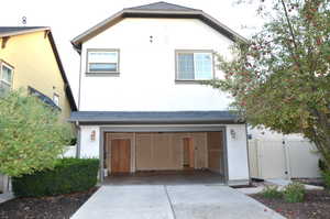 View of front of home with a garage