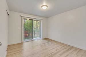 Empty room featuring light hardwood / wood-style floors