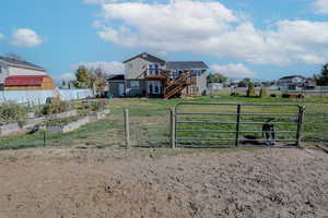 View of yard featuring a wooden deck