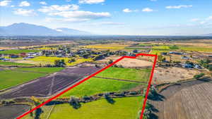 Birds eye view of property with a mountain view