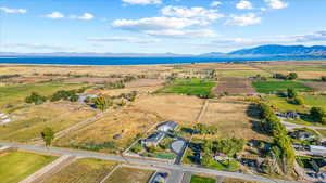 Aerial view featuring a water and mountain view