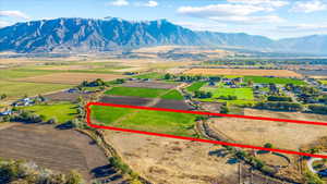 Aerial view with a rural view and a mountain view