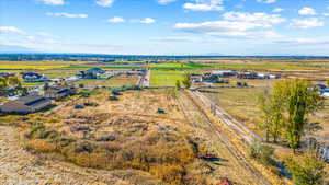 Birds eye view of property with a rural view