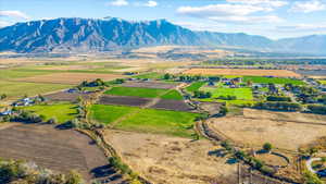 Drone / aerial view with a rural view and a mountain view