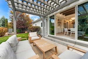 View of patio featuring a pergola and an outdoor living space