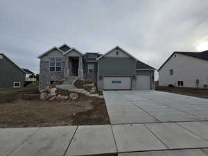 Craftsman-style home with a garage