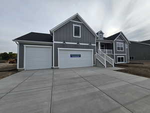 View of front of property featuring a garage