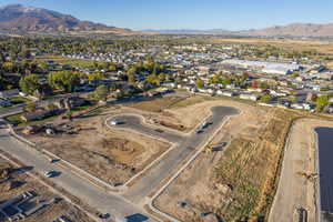 Birds eye view of property with a mountain view