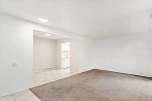 Carpeted empty room with sink