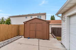 Exterior space featuring a storage shed