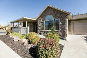 View of front of property with a garage