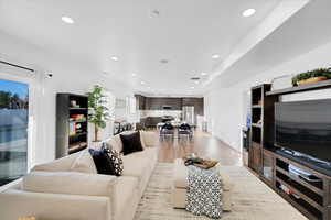 Living room featuring light wood-style floors