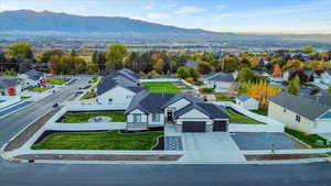 Birds eye view of property with a mountain view