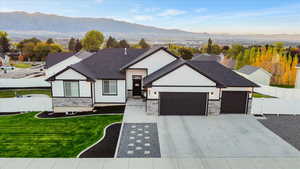 View of front of home featuring a mountain view