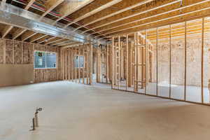 Miscellaneous room featuring concrete floors