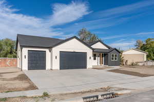 View of front of home with a garage