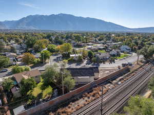 Birds eye view of property featuring a mountain view