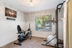 Exercise area with carpet flooring