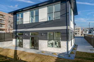 Rear view of property with a patio