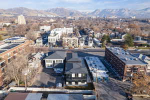 Birds eye view of property with a mountain view