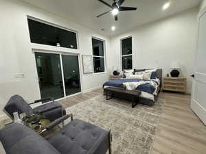 Bedroom featuring hardwood / wood-style flooring and ceiling fan