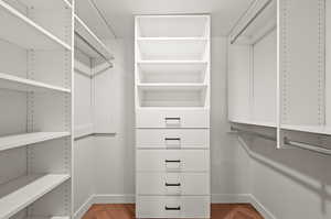 Spacious closet with parquet floors