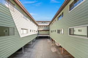 View of side of home featuring a patio