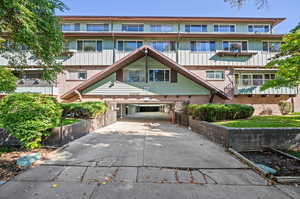 View of property featuring a garage