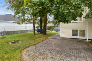 View of yard with a patio