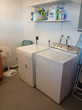 Laundry room featuring washer and dryer