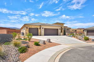 View of front of property with a garage