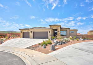 View of front of home featuring a garage