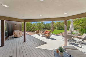 Deck featuring area for grilling, outdoor dining area, and outdoor lounge area